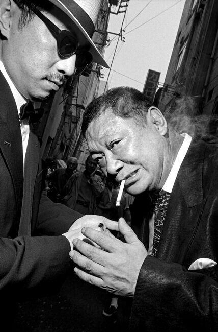 JAPAN. Asakusa. George ABE, right, an ex-Yakuza member and celebrity writer. Yakuza model themselves on American gangster fashion from 1950s. 1998.